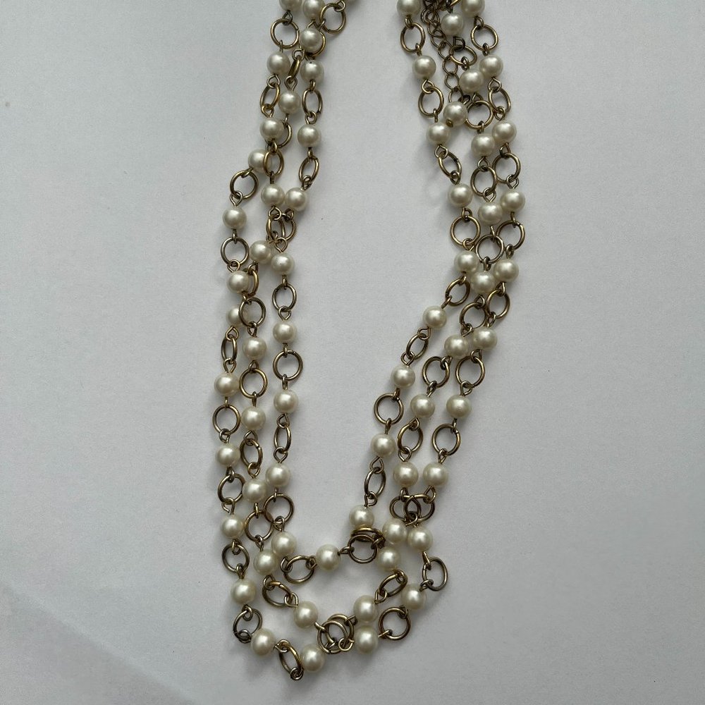 Simulated pearl and gold necklace